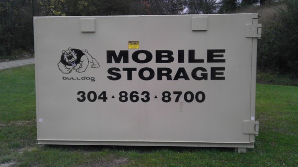 Storage unit, side view with phone number